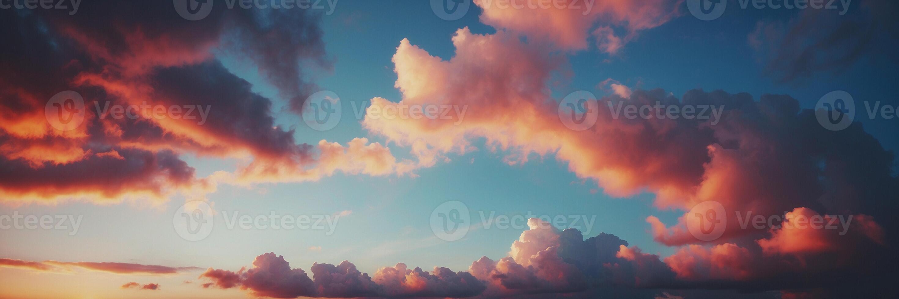 A beautiful sunset with clouds in the sky photo