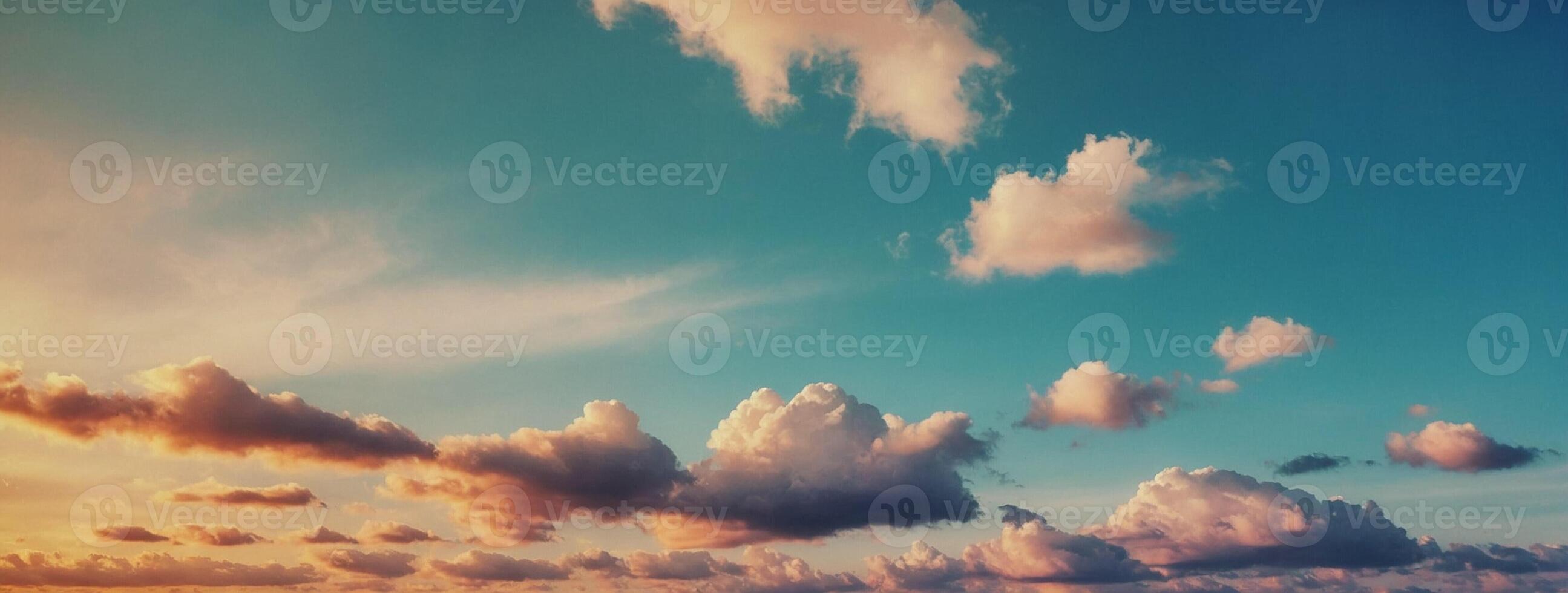 Clouds over the ocean at sunset photo
