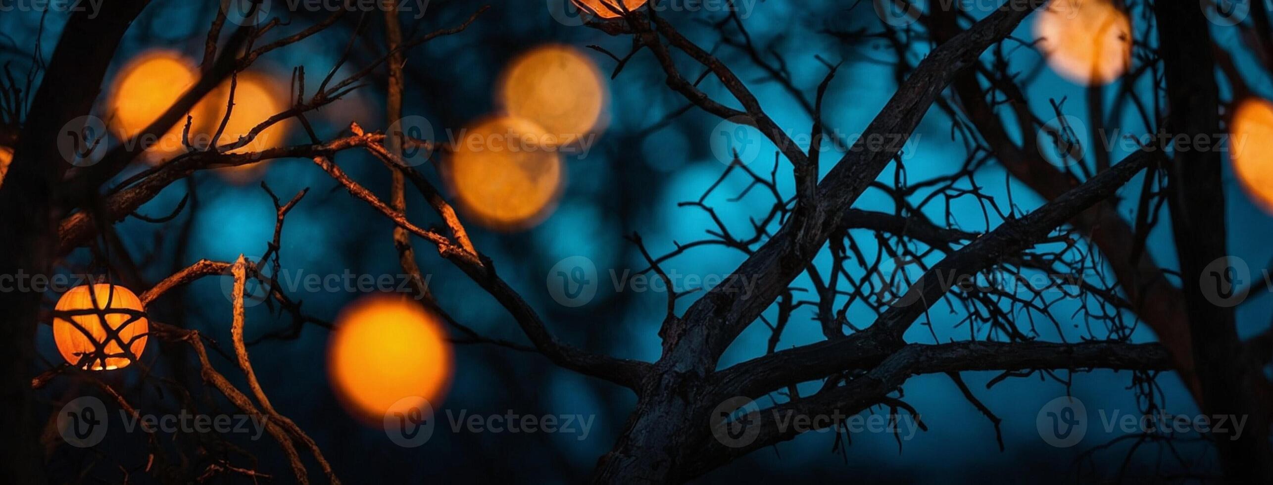 Orange lights on a tree branch photo