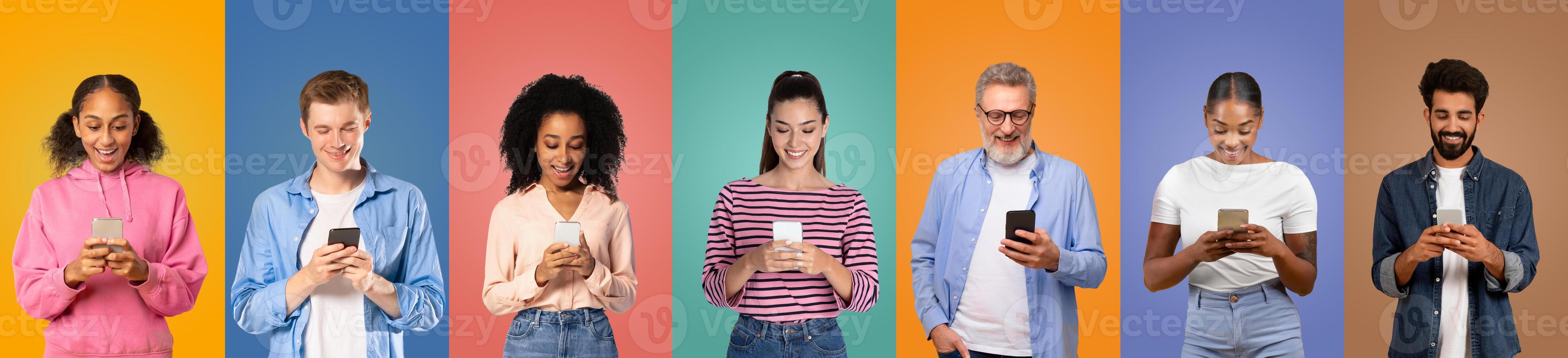 A diverse group of individuals, both young and older, are engaged with their smartphones while standing in front of vibrant, multicolored backgrounds photo