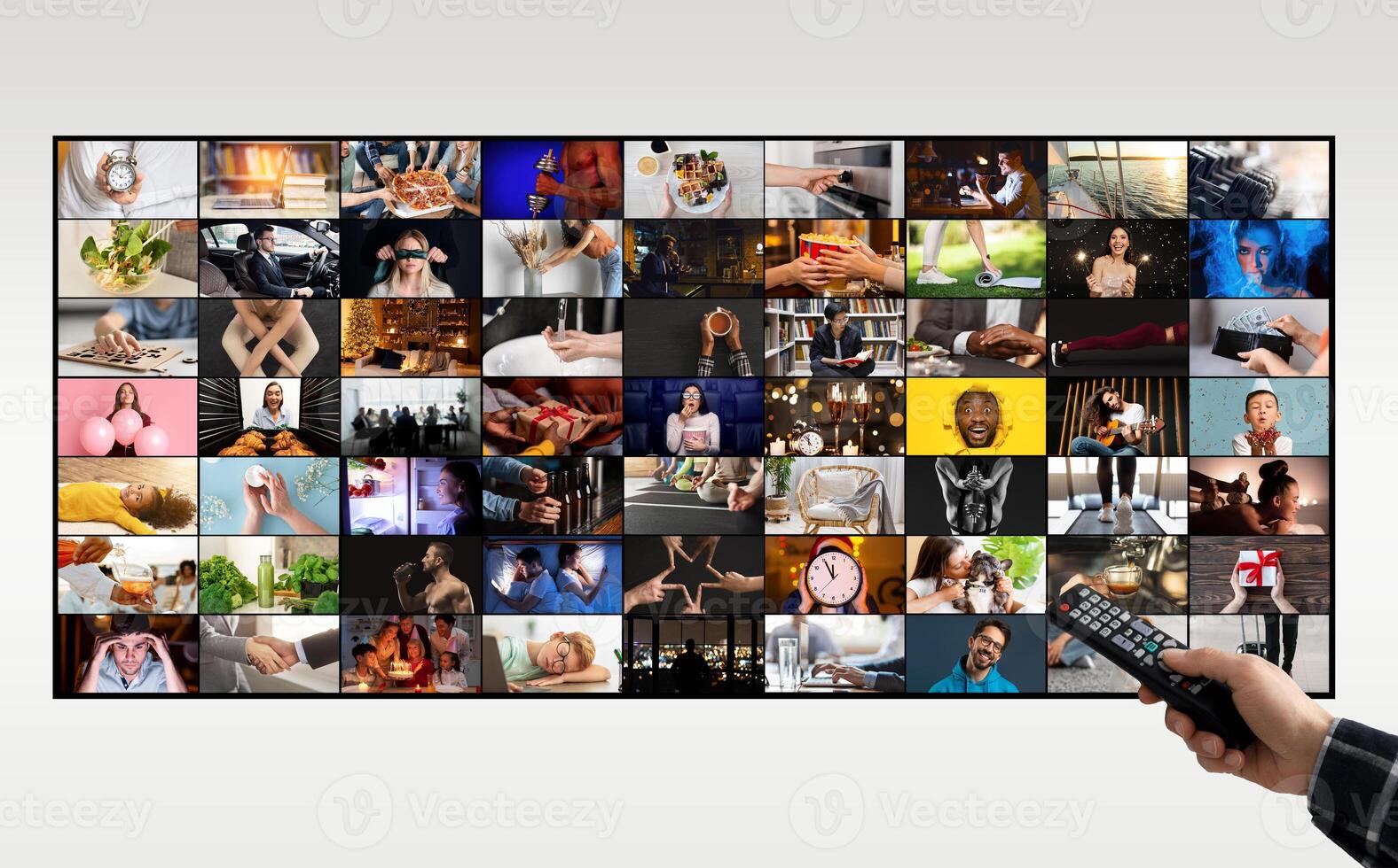 A hand holding a remote control is pointing at a flat-screen television displaying a grid of various images. The images are diverse and range from everyday activities to more unique scenes photo