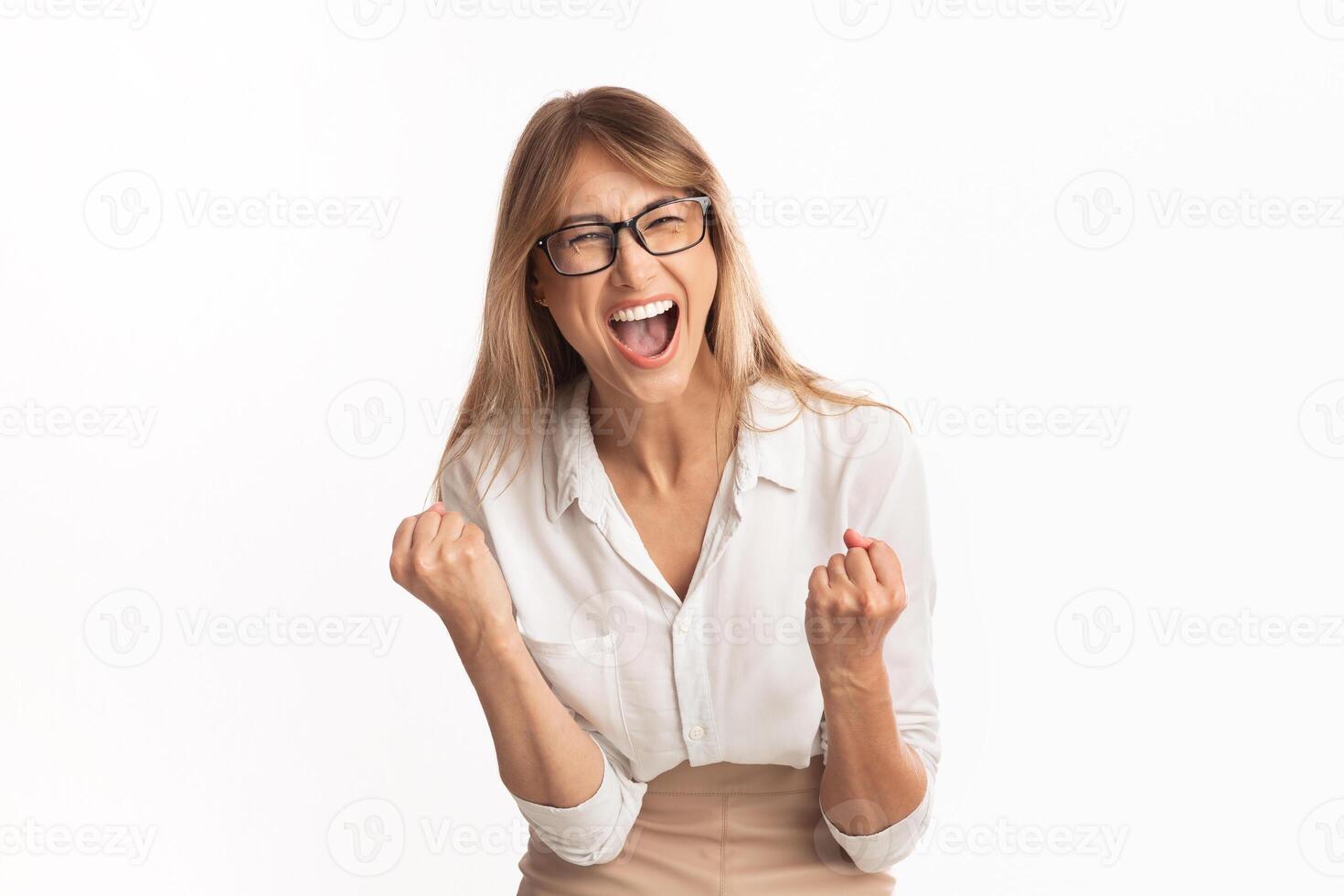 Excited Businesswoman Shouting Gesturing Yes Celebrating Business Success Standing Over White Studio Background. Free Space photo