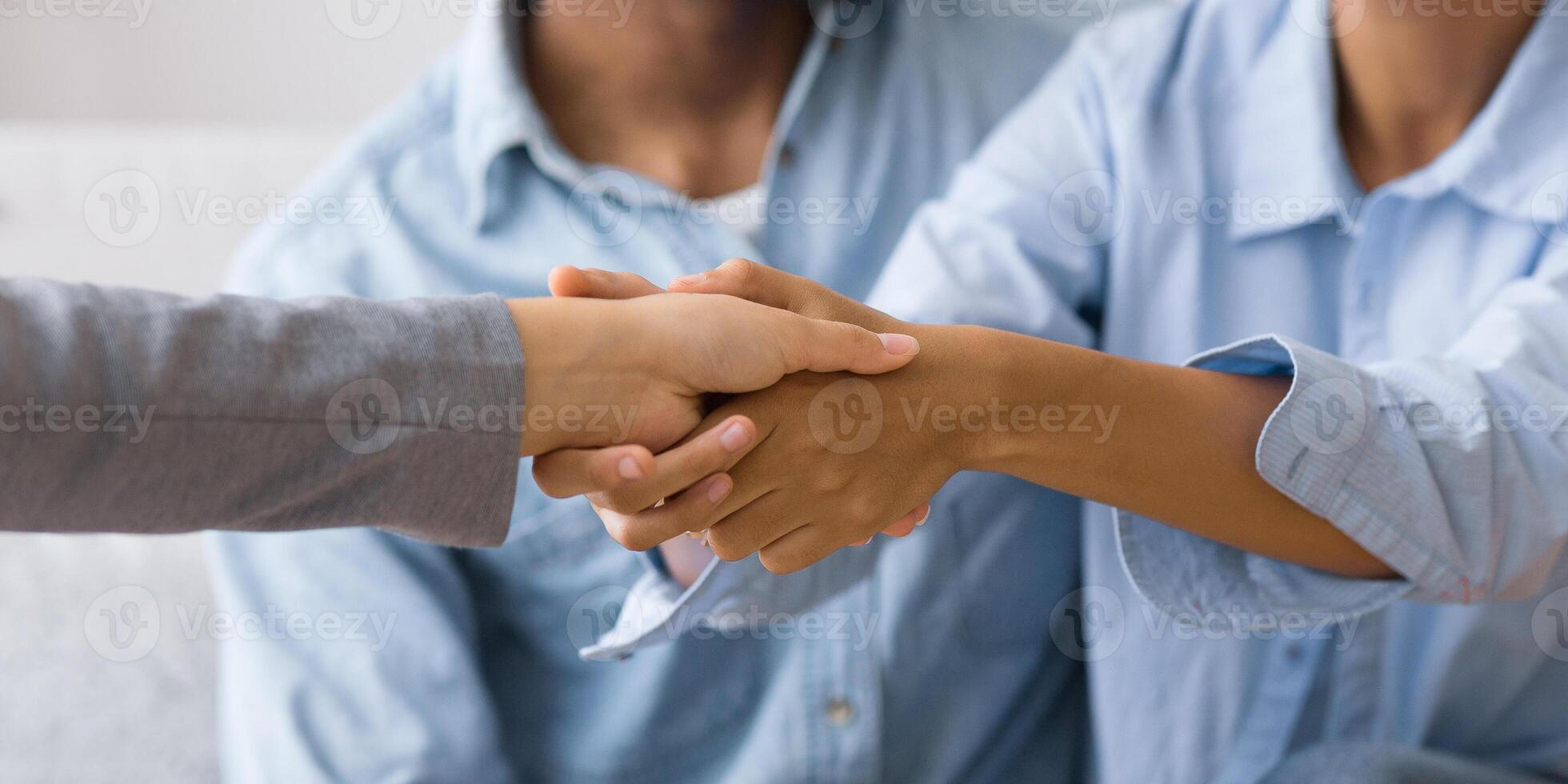 Effective Marital Therapy. Thankful Afro Spouses Handshaking With Relationship Coach In Office. Selective Focus, Panorama photo