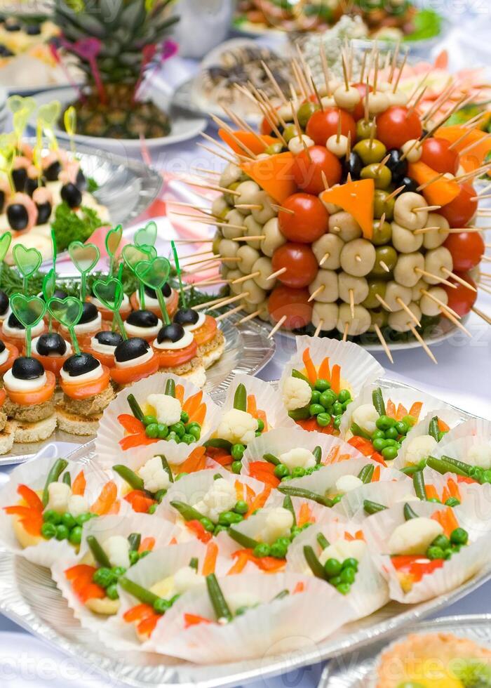 Catering buffet style for banquet. Snacks and appetizers. Restaurant food, Wedding served table. photo