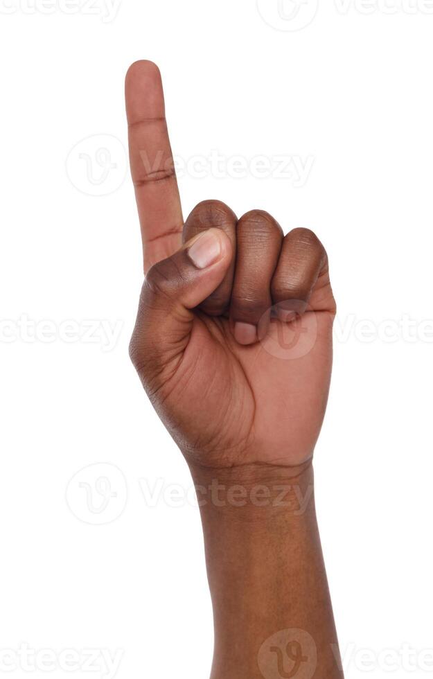 Black hand shows number one isolated. Counting gesturing, enumeration, white background photo