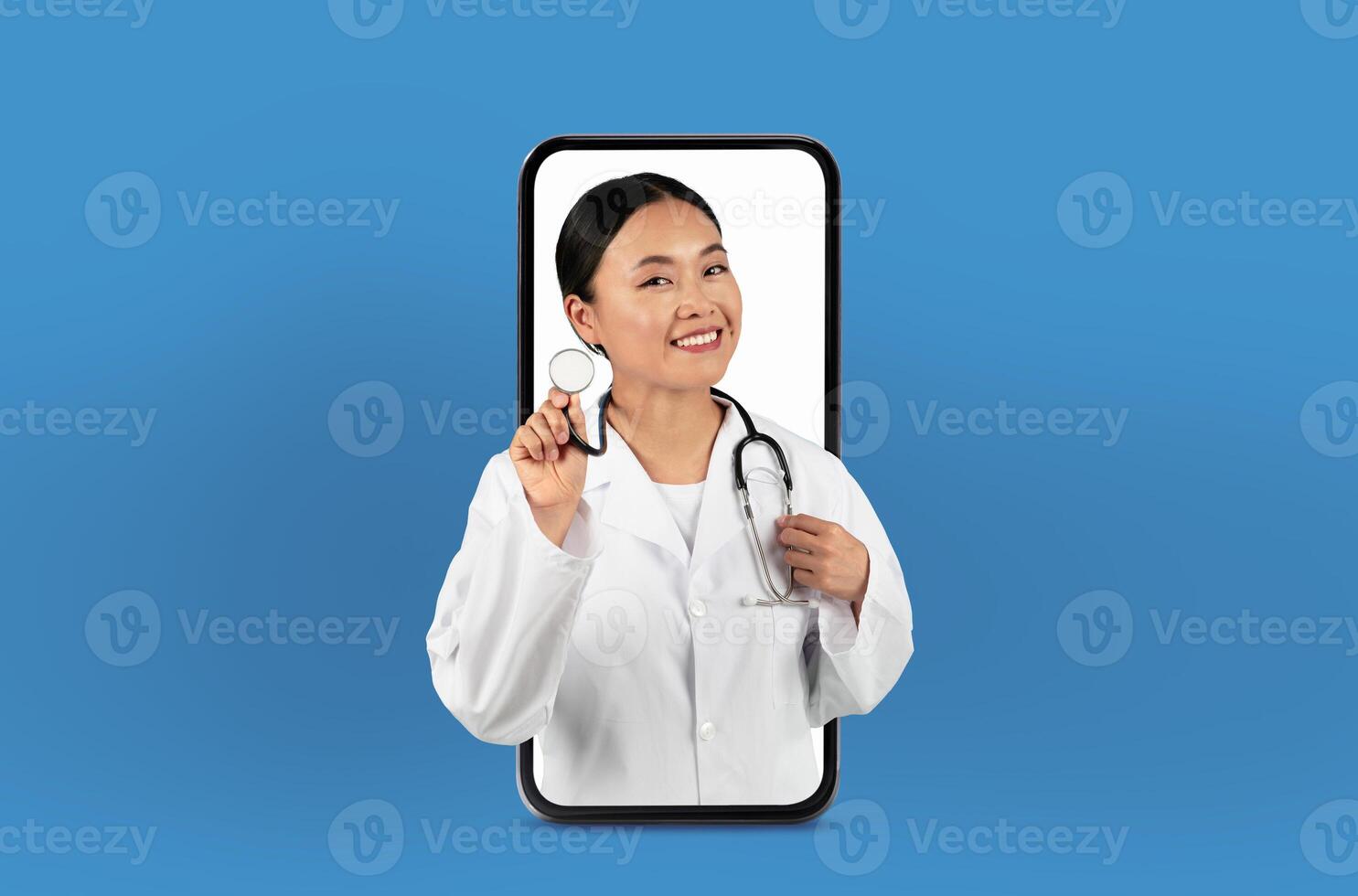 This image shows a young asian woman doctor on a smartphone screen, delivering innovative telehealth services from a neat, professional office. photo