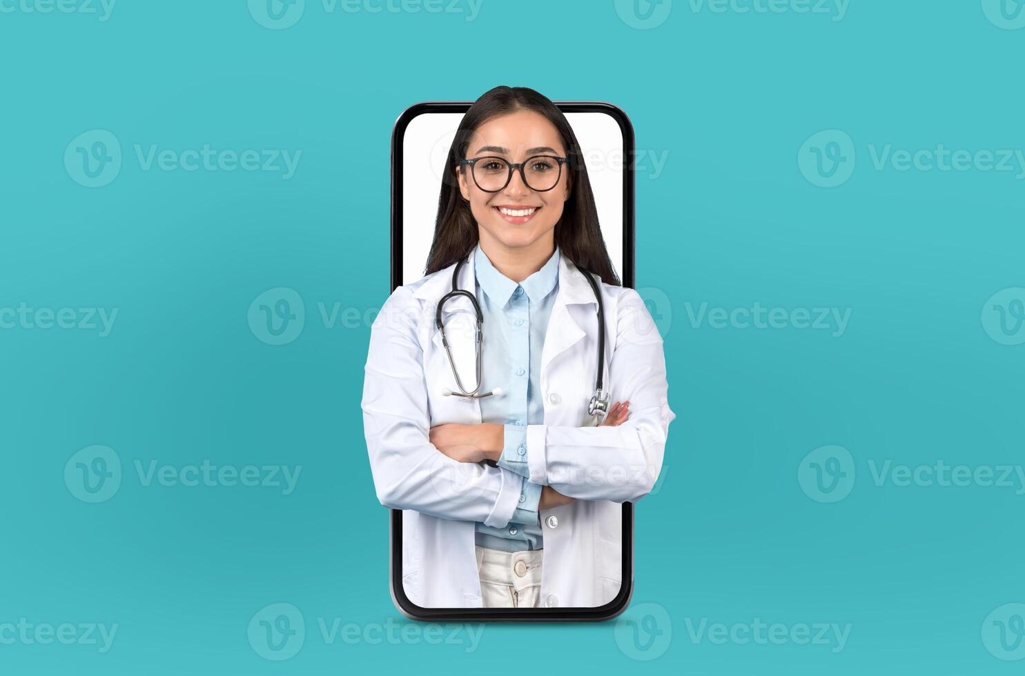 A woman in a white lab coat is standing on a phone screen, appearing as if she is inside the screen. The setting suggests a digital or virtual reality concept being portrayed. photo