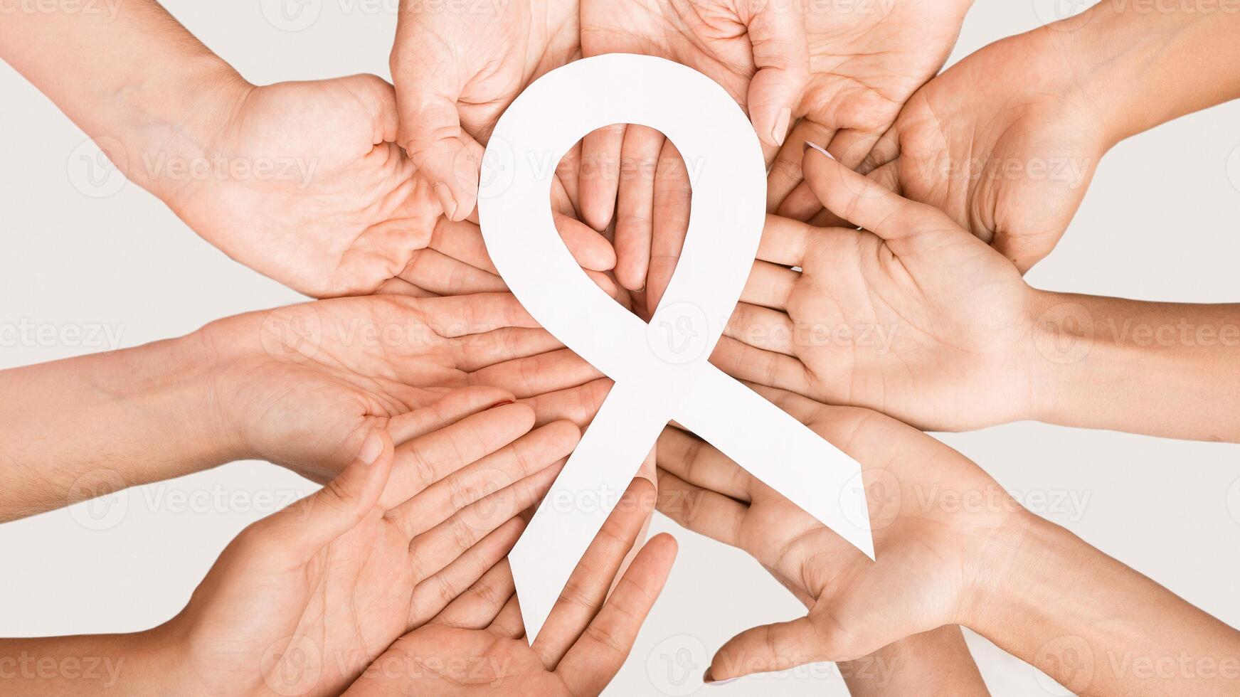 Women Hands Circle Holding Breast Cancer Symbol Big White Ribbon Standing Together. Awareness Campaign. Top View photo