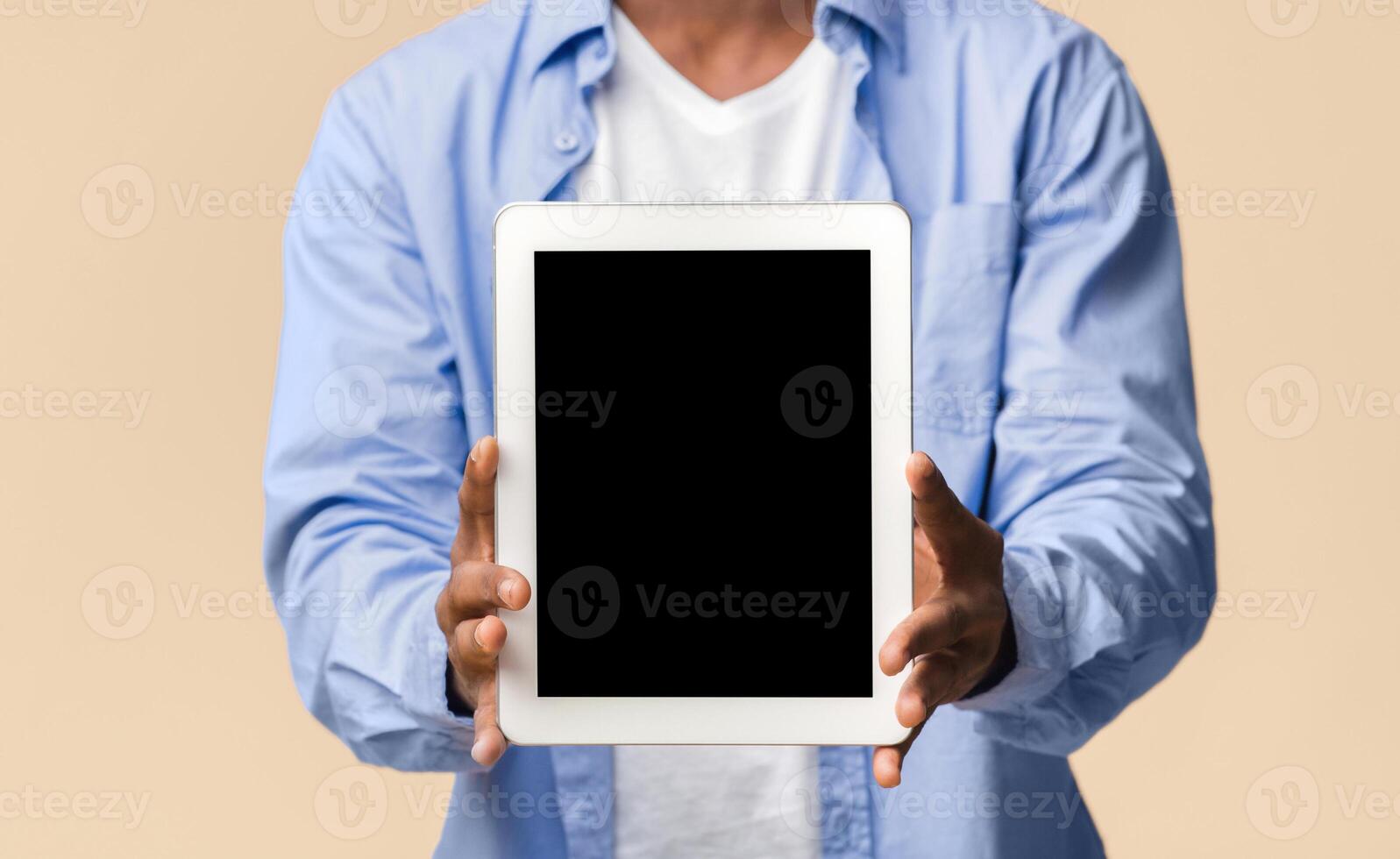 Great Application. Smiling Black Guy Showing Blank Tablet Computer Screen Posing On Yellow Studio Background. Mockup, Cropped photo