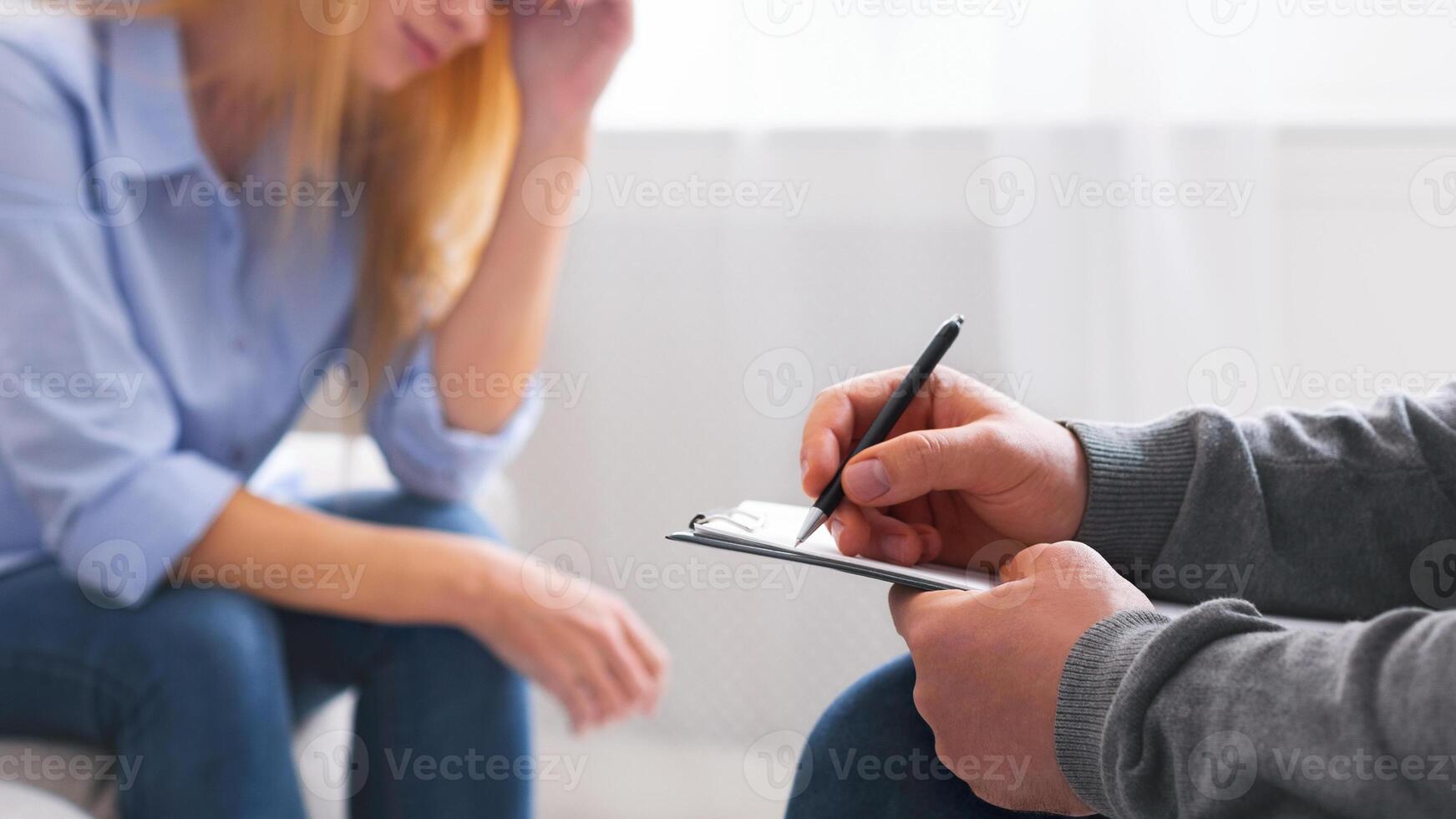 Personal psychological consultation. Depressed woman discussing her problems with therapist, panorama photo