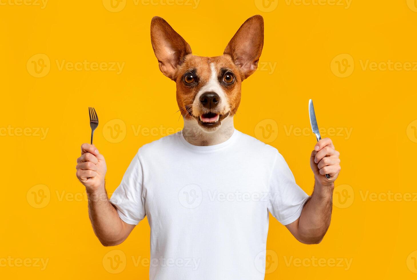 A cheerful dog character with human-like features stands holding a fork in one hand and a knife in the other. The bright yellow backdrop enhances the playful atmosphere photo