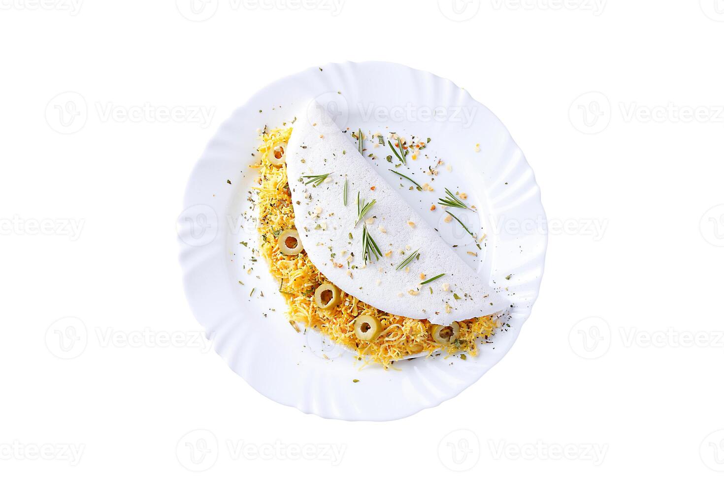homemade tapioca or beiju stuffed with boiled chicken and olives isolated on white background photo