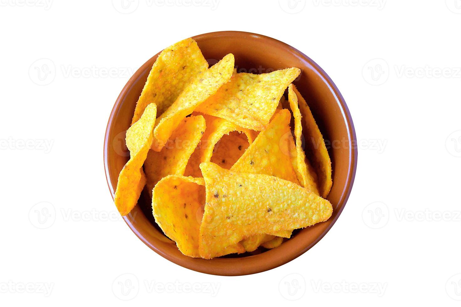 Crispy corn tortilla nachos chips placed in ceramic bowl isolated on white background photo