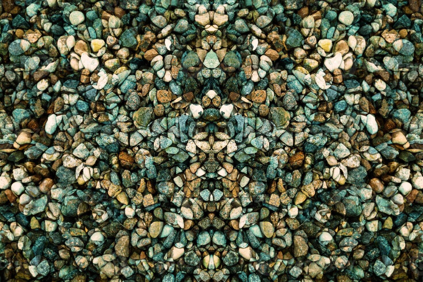 A pattern of rocks and pebbles in a pattern photo