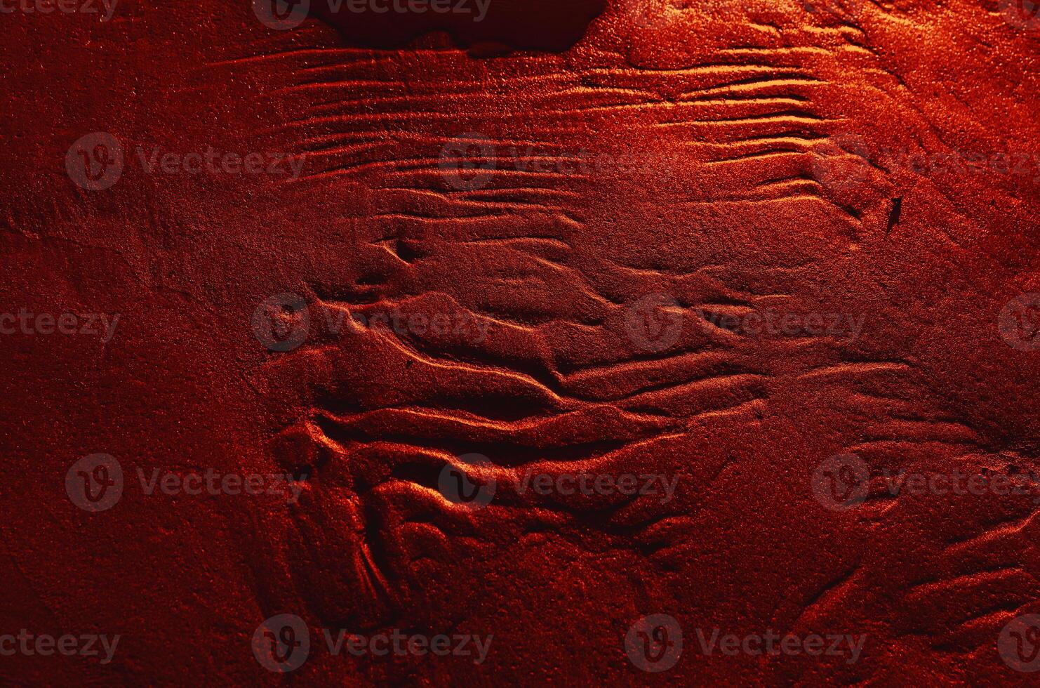 Dunes on the sea shore. Ripples in wet sand background texture. Beach sand background photo