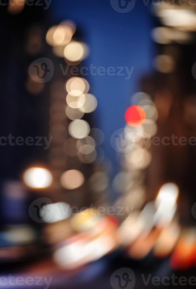 Blurred image of city lights at night photo