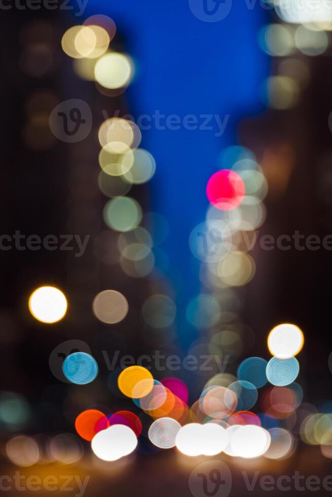 Blurred city lights and traffic lights in the background photo