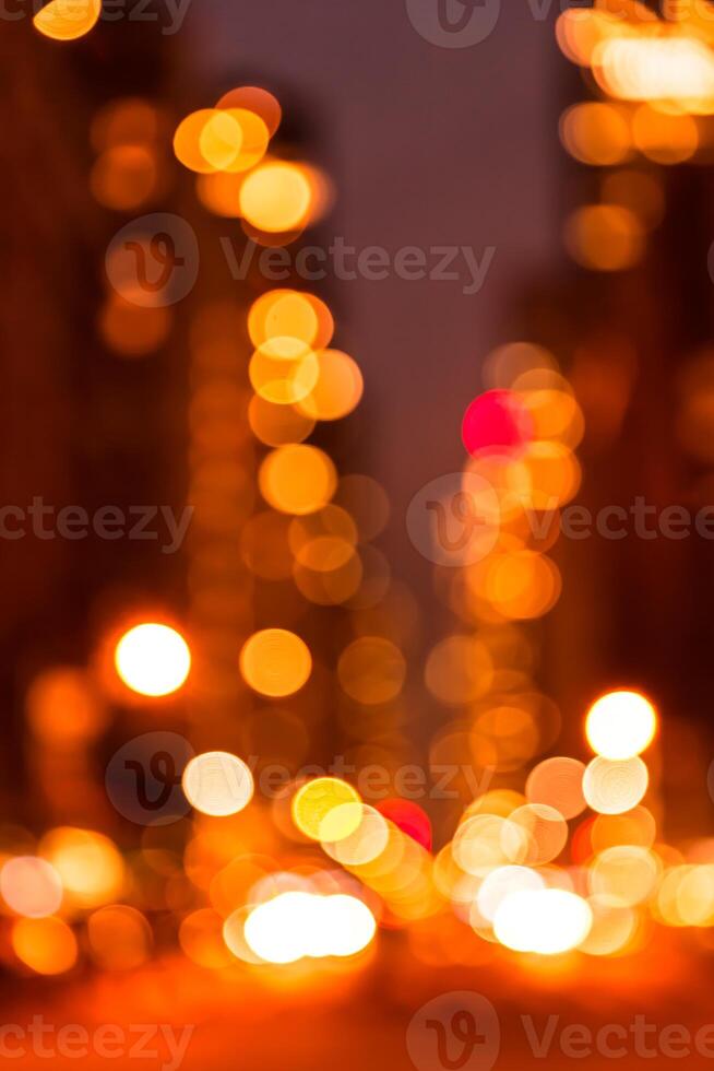 Abstract bokeh light background of city street at night photo