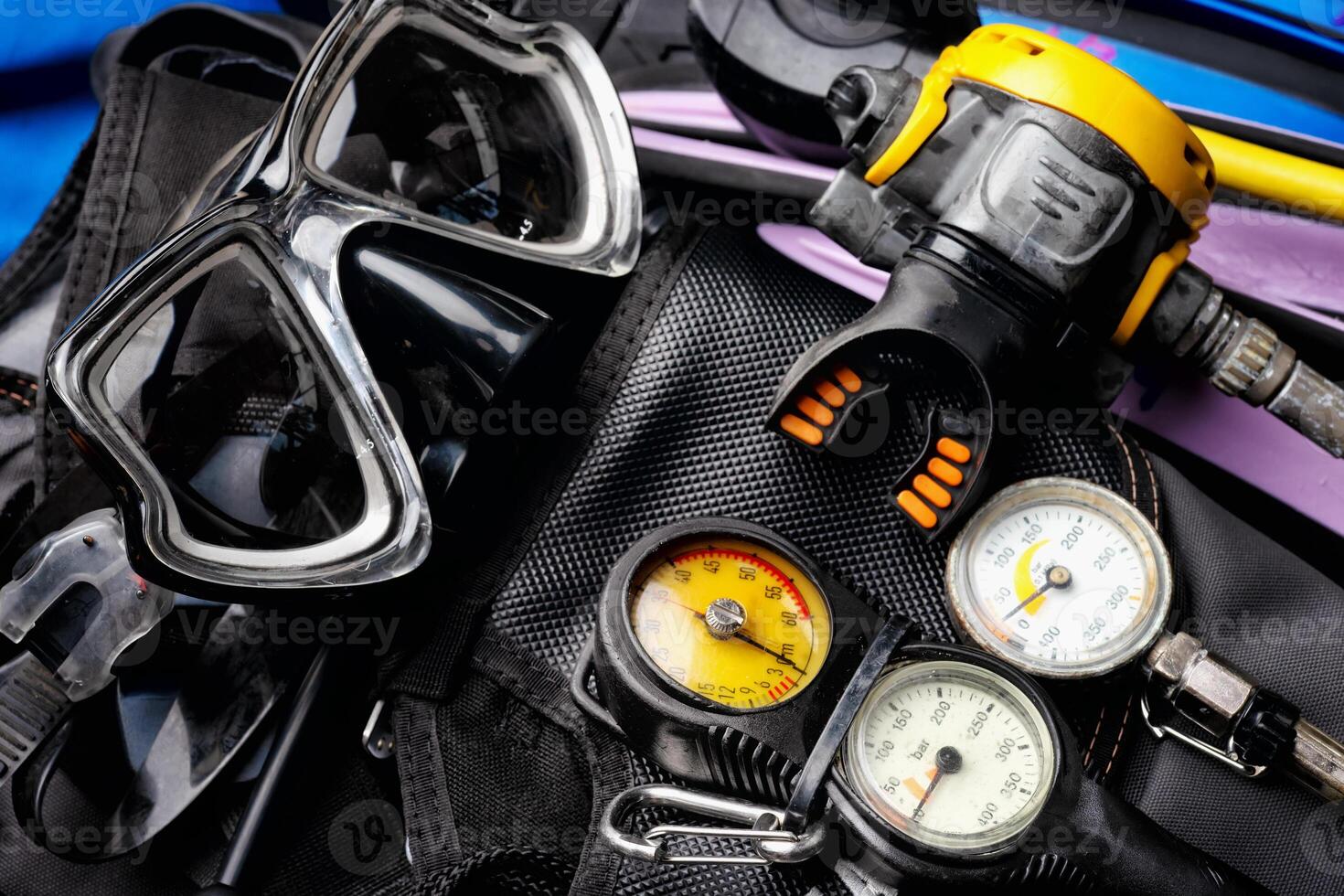 Scuba Fins, Regulator Octopus, Depth Gauge , Balanced Regulator ,Power Inflator ,Dive Mask and Snorkel , Scuba Gear for a Dive on a Boat photo