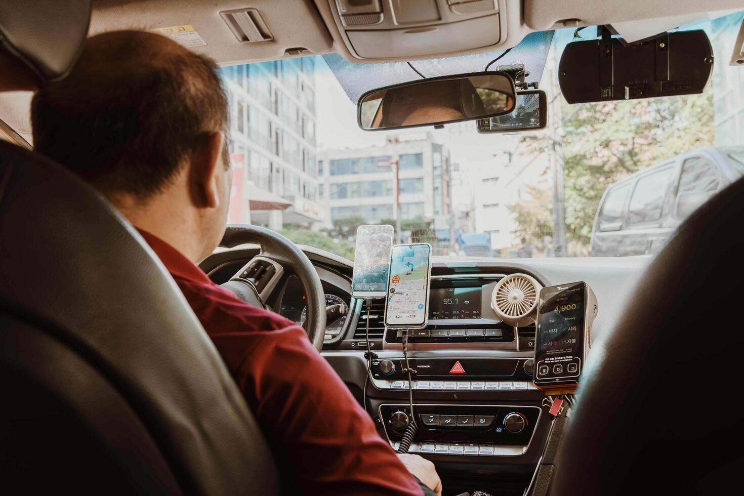 SEOUL,SOUTH KOREA -SEPTEMBER 27 2024-Communication devices, telephones, navigation devices show maps in taxi in SEOUL,SOUTH KOREA photo