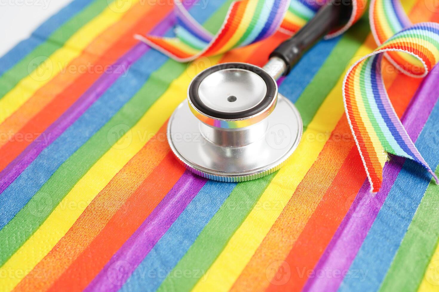 LGBT symbol, Stethoscope on rainbow flag, rights and gender equality, LGBT Pride Month in June. photo