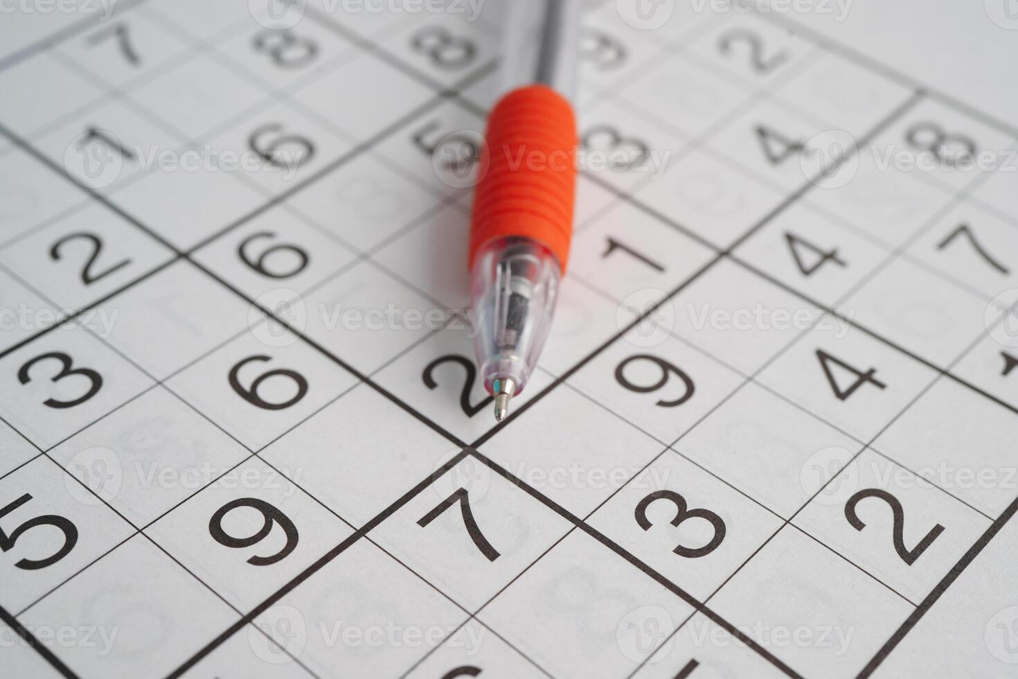 Sudoku puzzle, game to play for keep you brain younger for developing Alzheimer disease in senior patient. photo