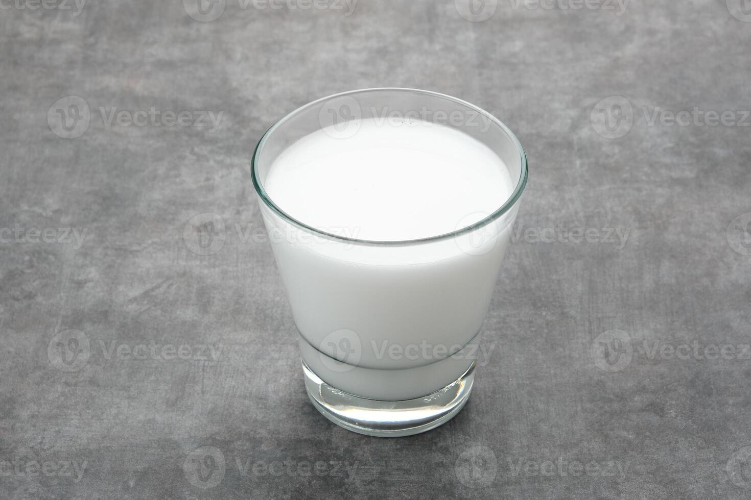 Fresh Coconut Milk on glass photo