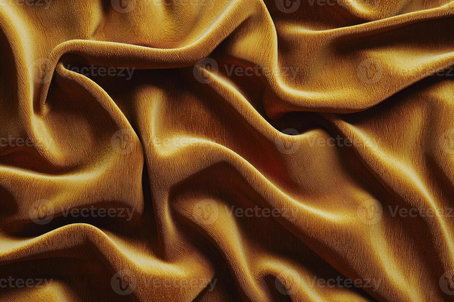Elegant, smooth golden silk fabric draping beautifully. photo