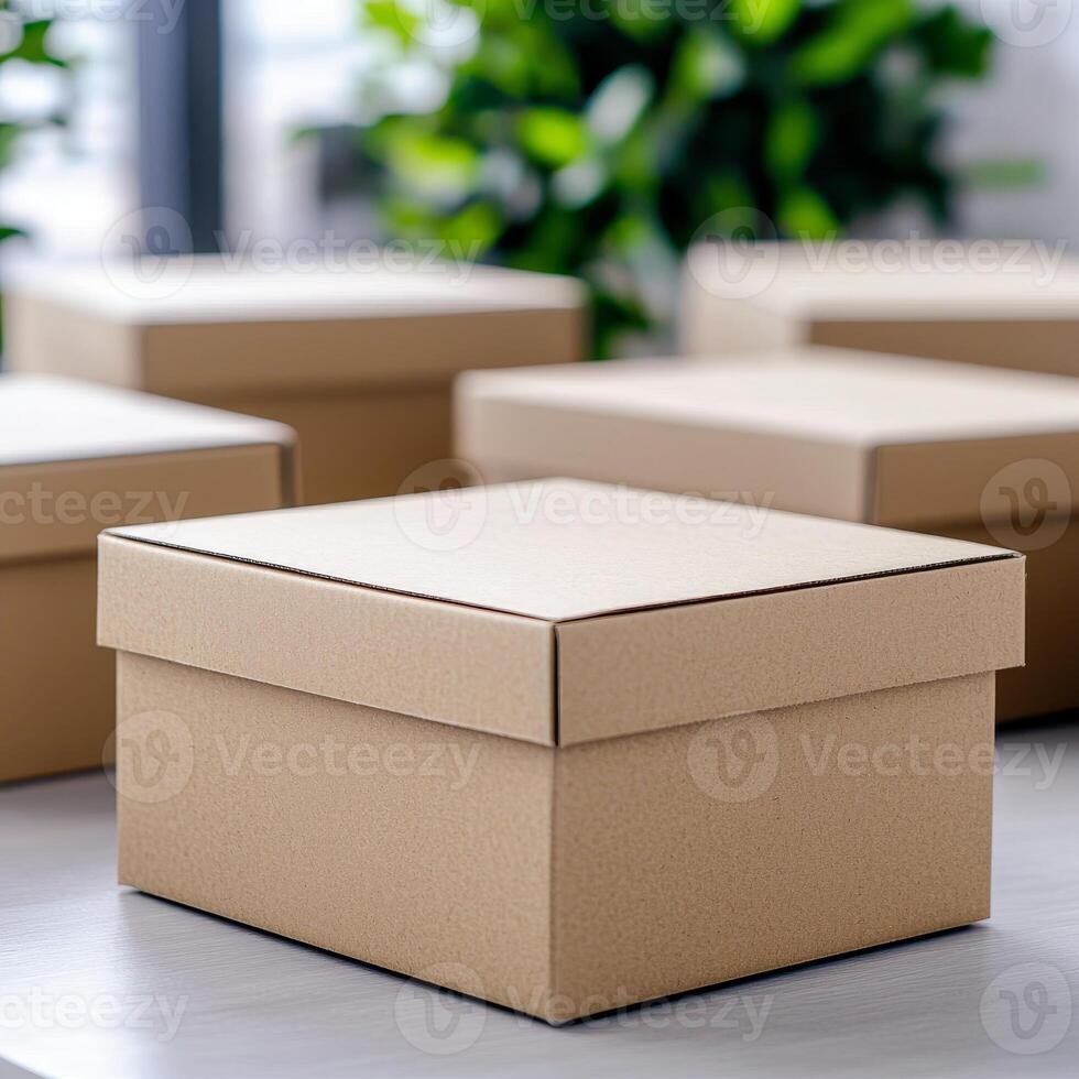Brown cardboard box on a table with greenery in the background. photo