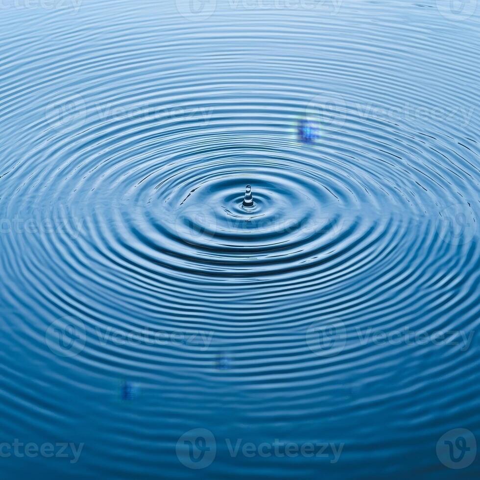 Ripples in blue water create a calming and serene effect on the surface. photo