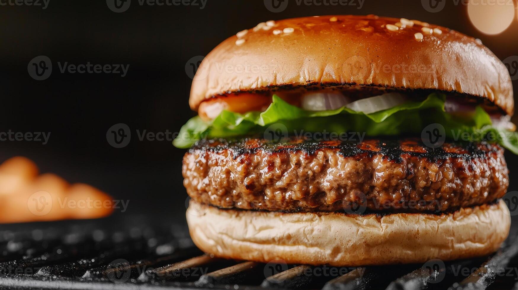 Delicious burger with fresh lettuce, tomato, and grilled patty on a toasted bun. photo