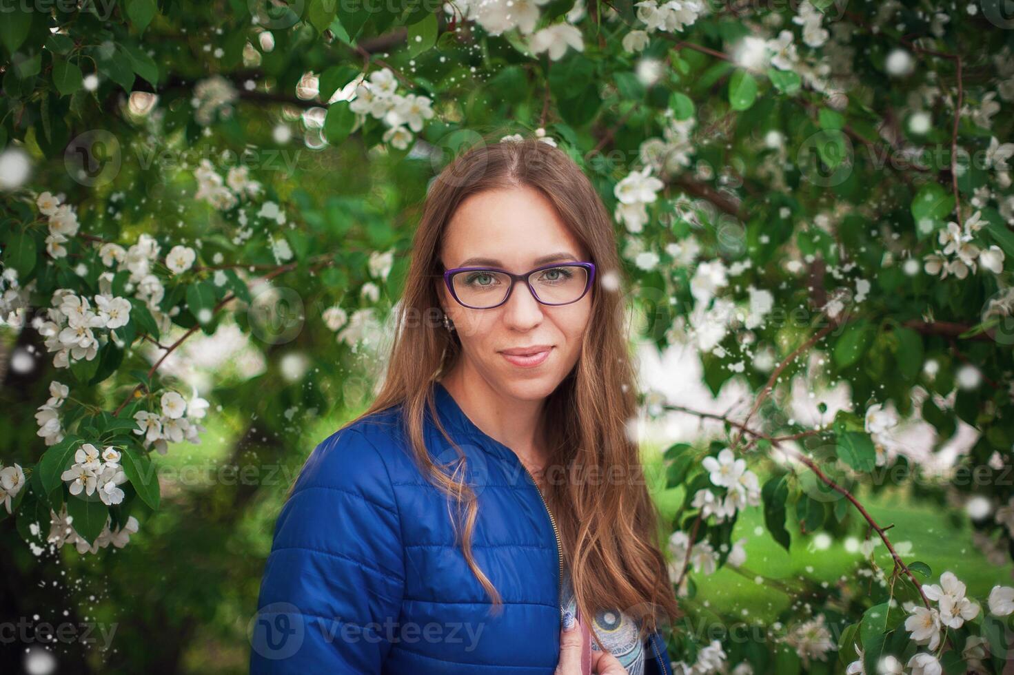 woman portrait in the garden of apple photo