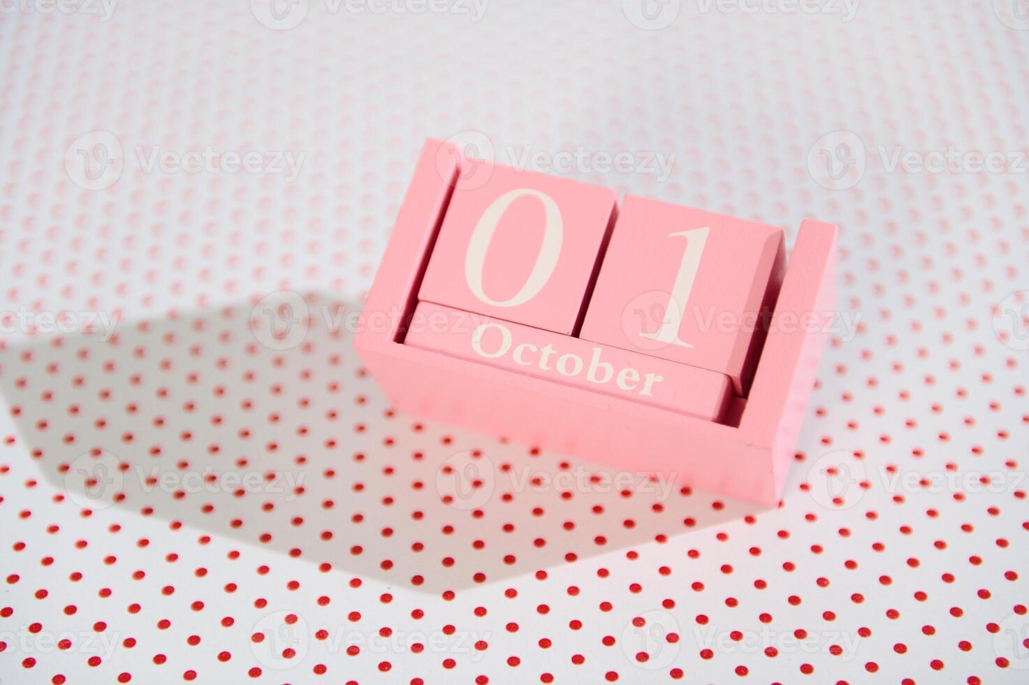 Pink Calendar Block Displaying October 1st photo