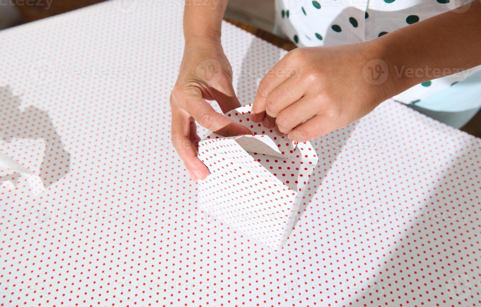 Gift Wrapping with Polka Dot Paper photo