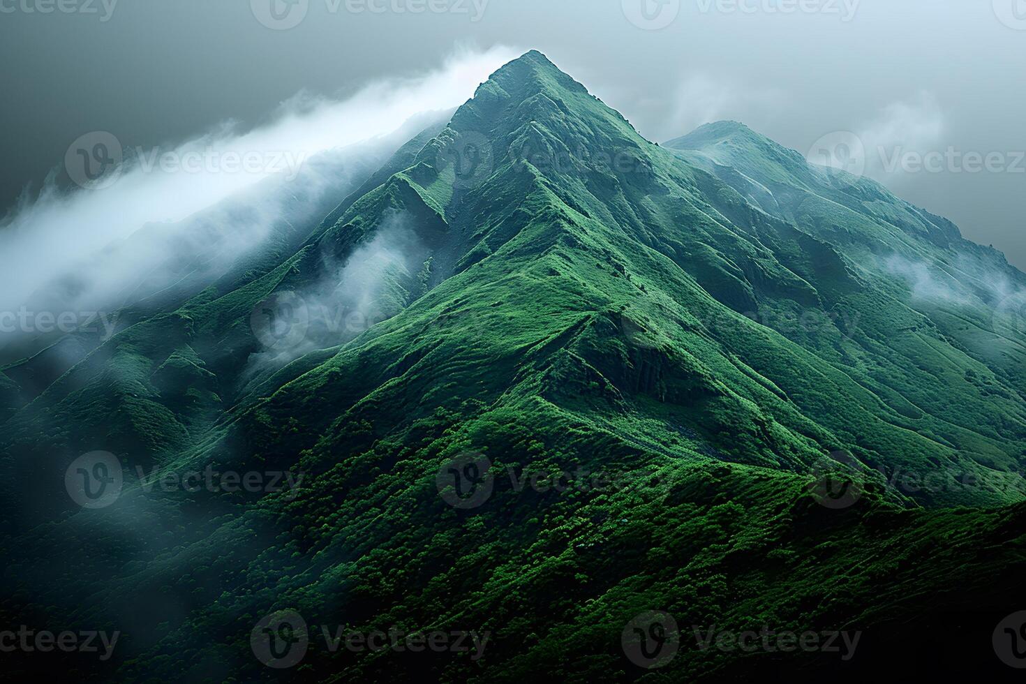 Majestic Mountain Peak Surrounded by Mist and Lush Greenery - Nature, Landscape, Outdoor Adventure photo