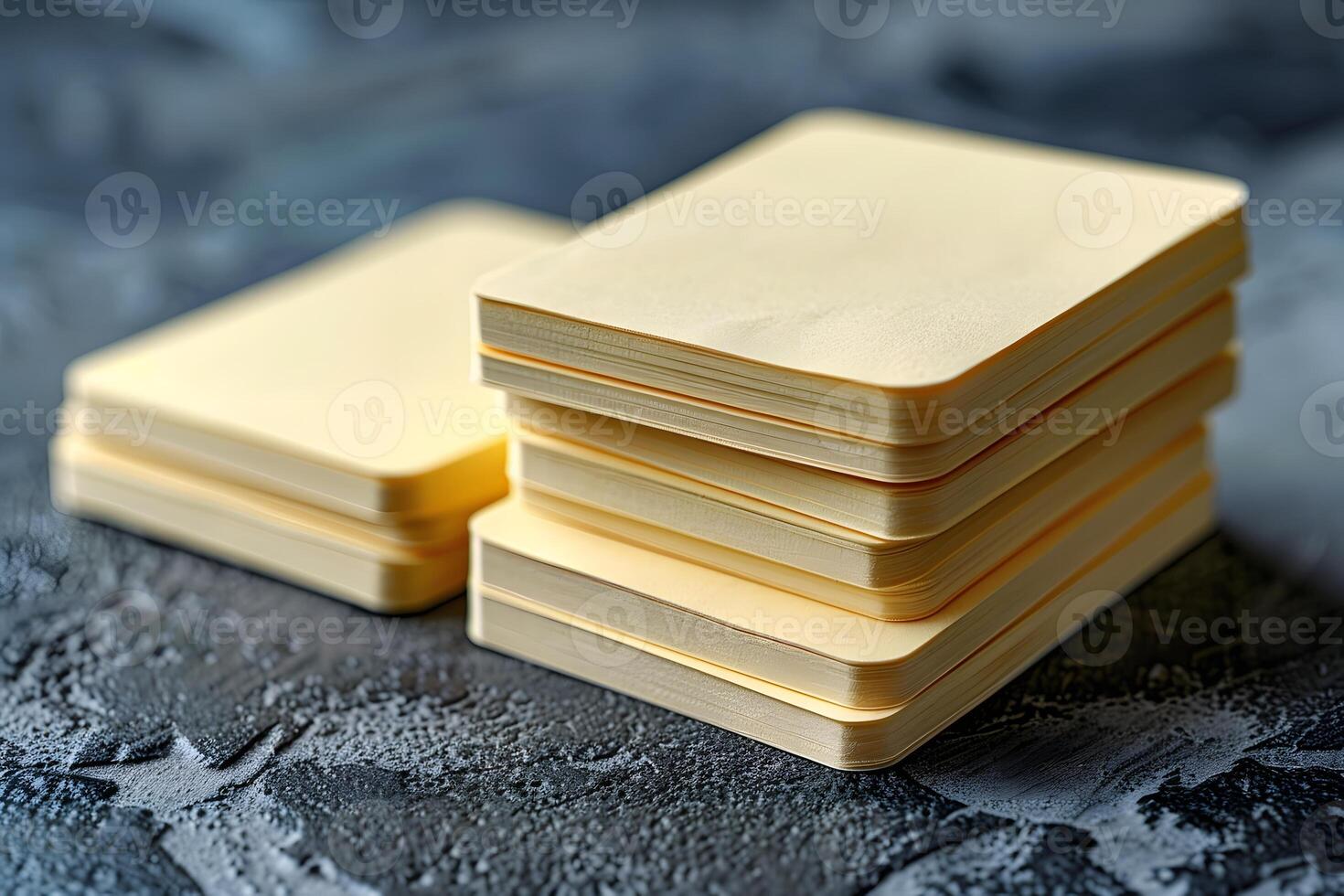 Stacked Blank Cards on Textured Grey Background for Business or Creative Design Projects photo