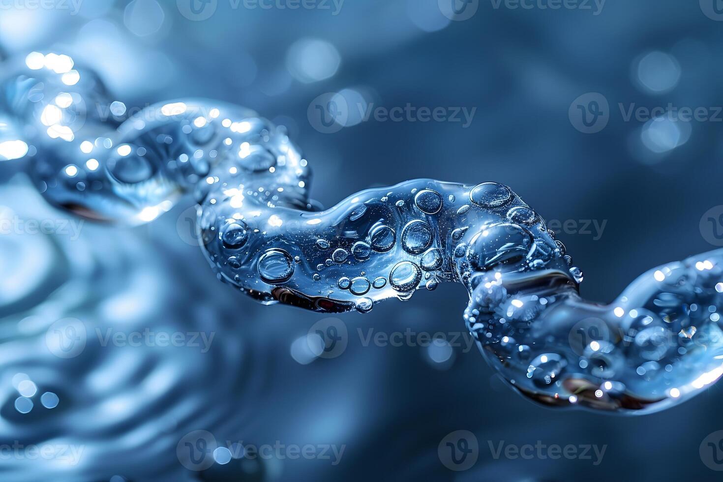 Close-Up of Water Droplets on Reflective Chain in Blue Ambient Light for Abstract Design photo