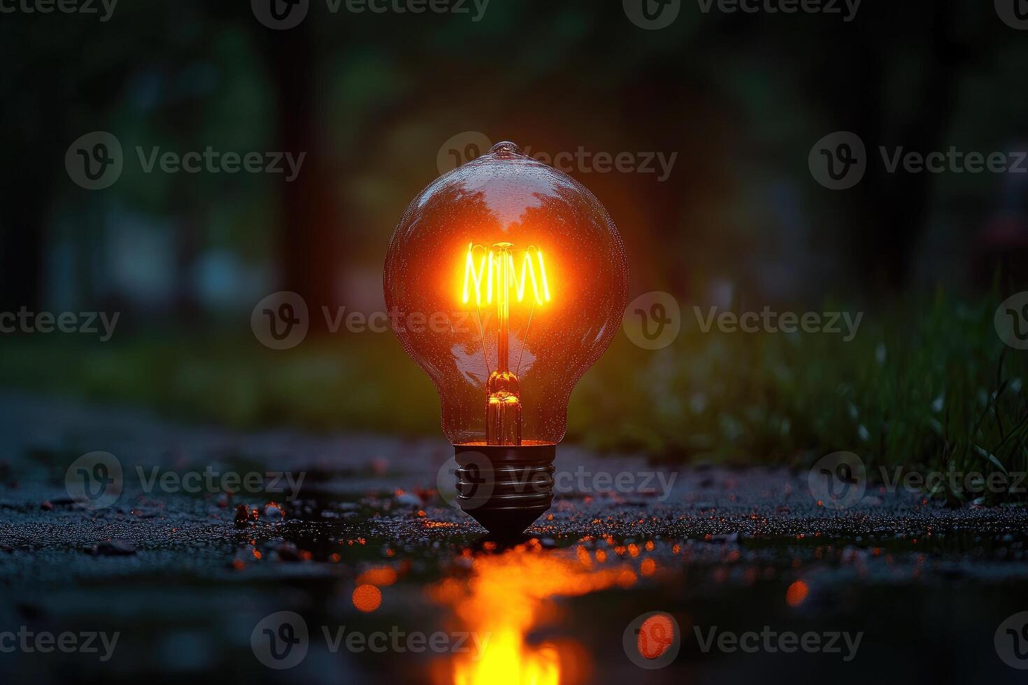 A light bulb is lit up on the ground photo