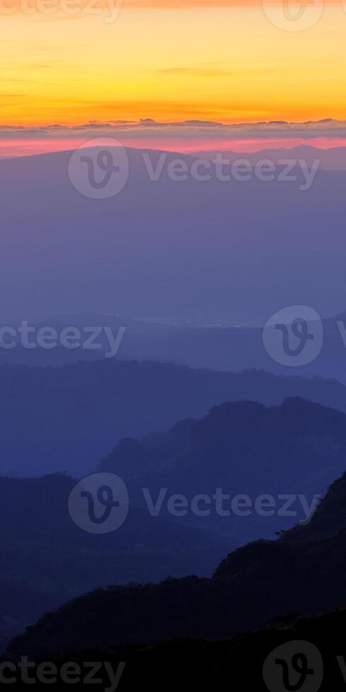 A view of the mountains at sunset photo