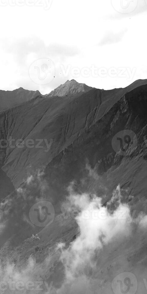 A black and white photo of a mountain range