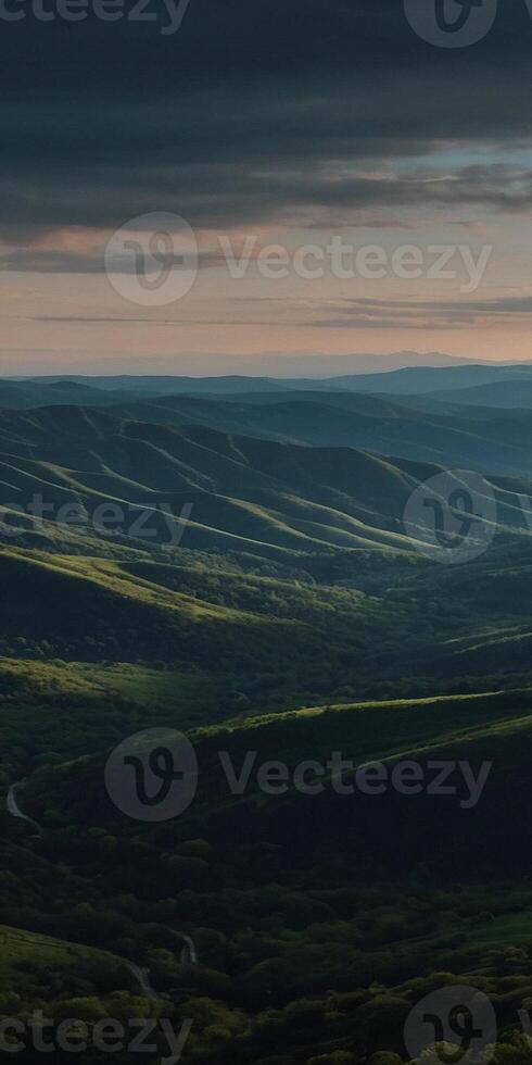 A view of the mountains from a hill photo