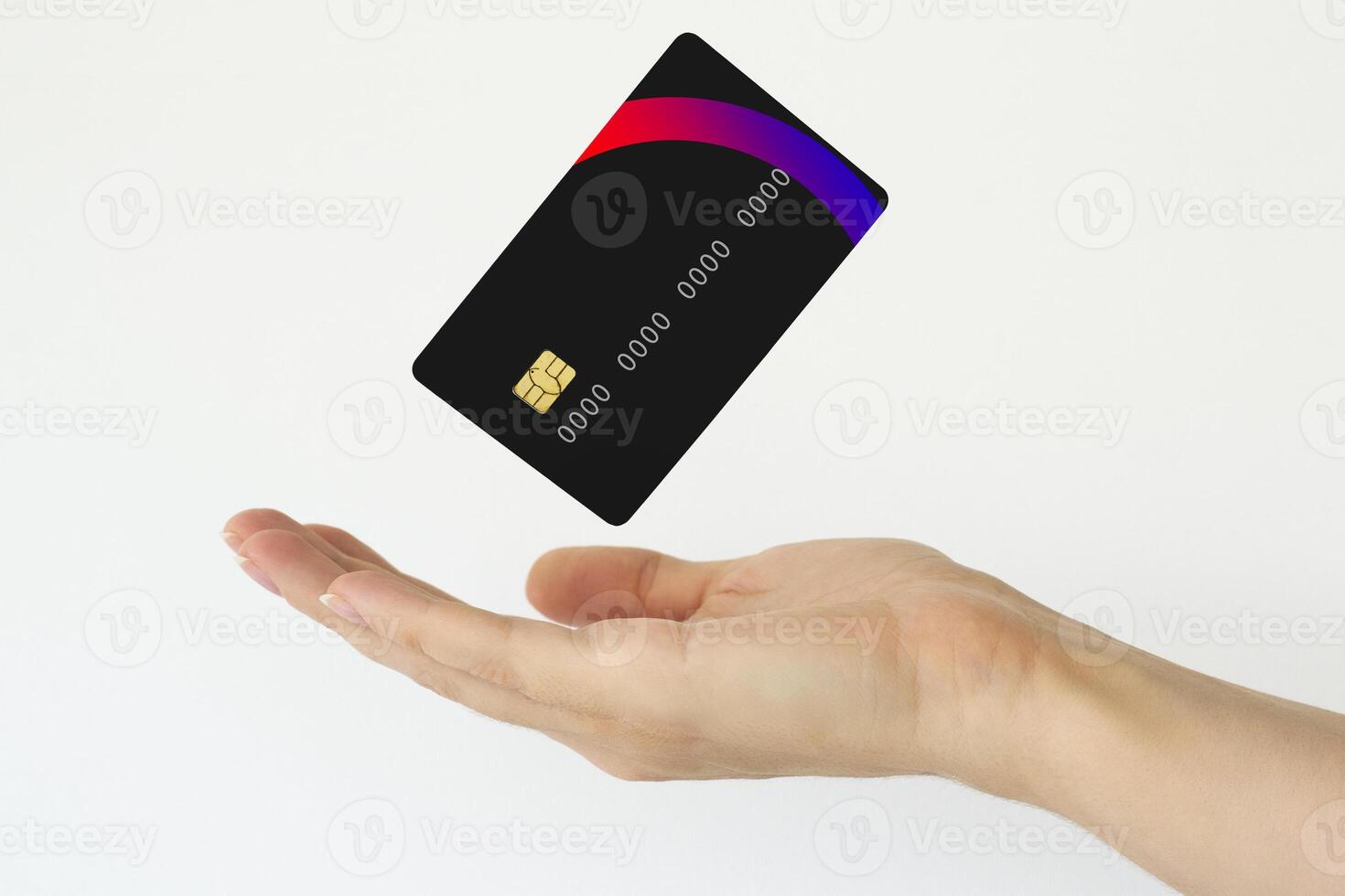 Close up female hand holds levitating template mockup Bank credit card with online service isolated on white background photo