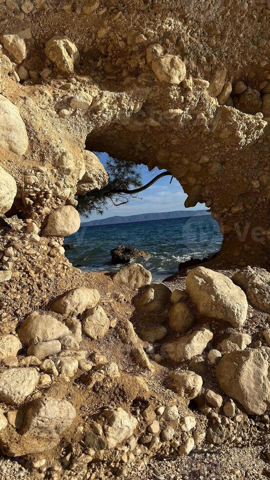 View from a cave to the Adriatic Sea, Croatia. Landscape photo