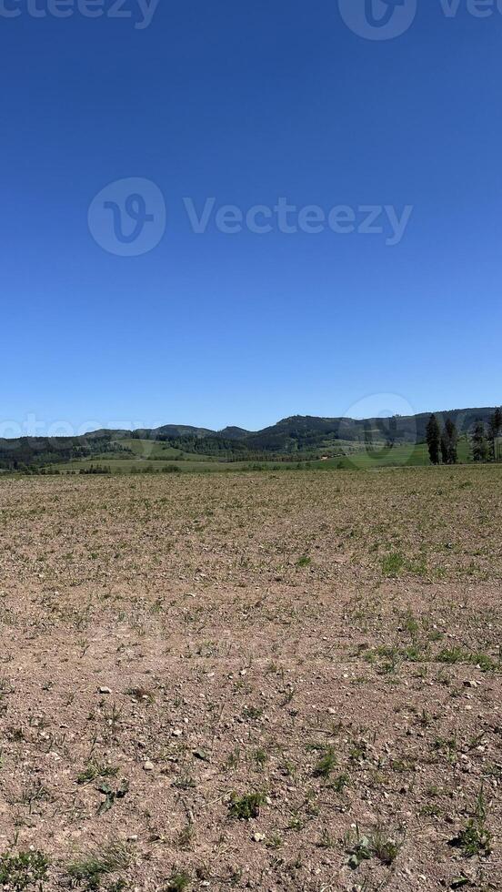 Spring ploughed land in the highlands of Poland. Landscape photo