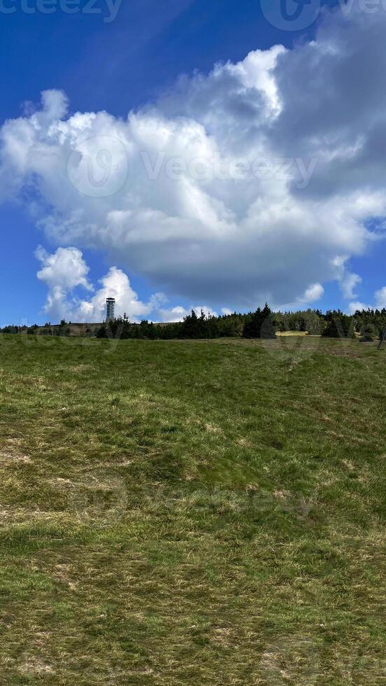 Observation tower on the peak of Mount Kralicky Sneznik in the Eastern Sudetes on the border of Poland and the Czech Republic photo