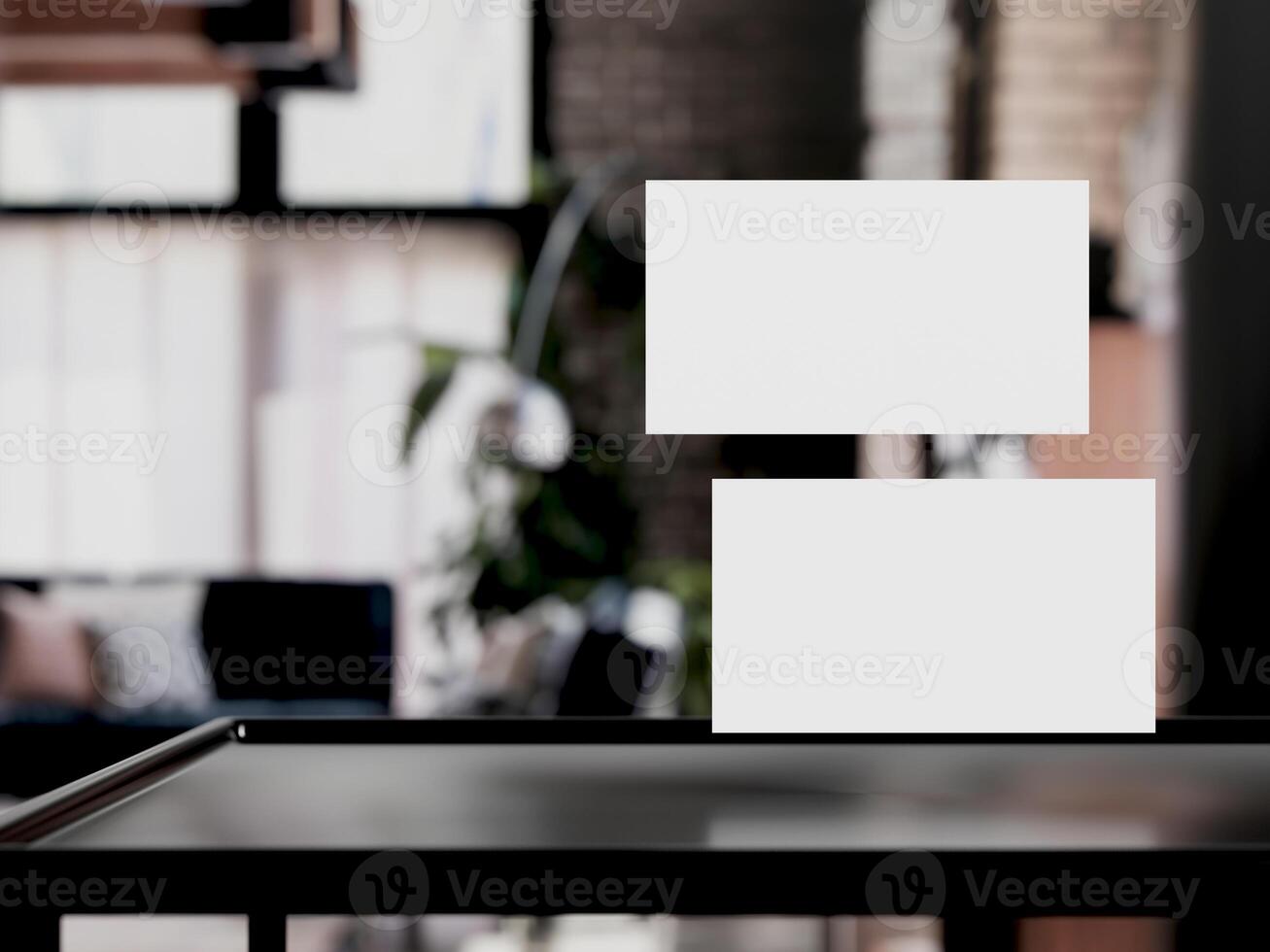 Clean minimal business card mockup on table with office background photo