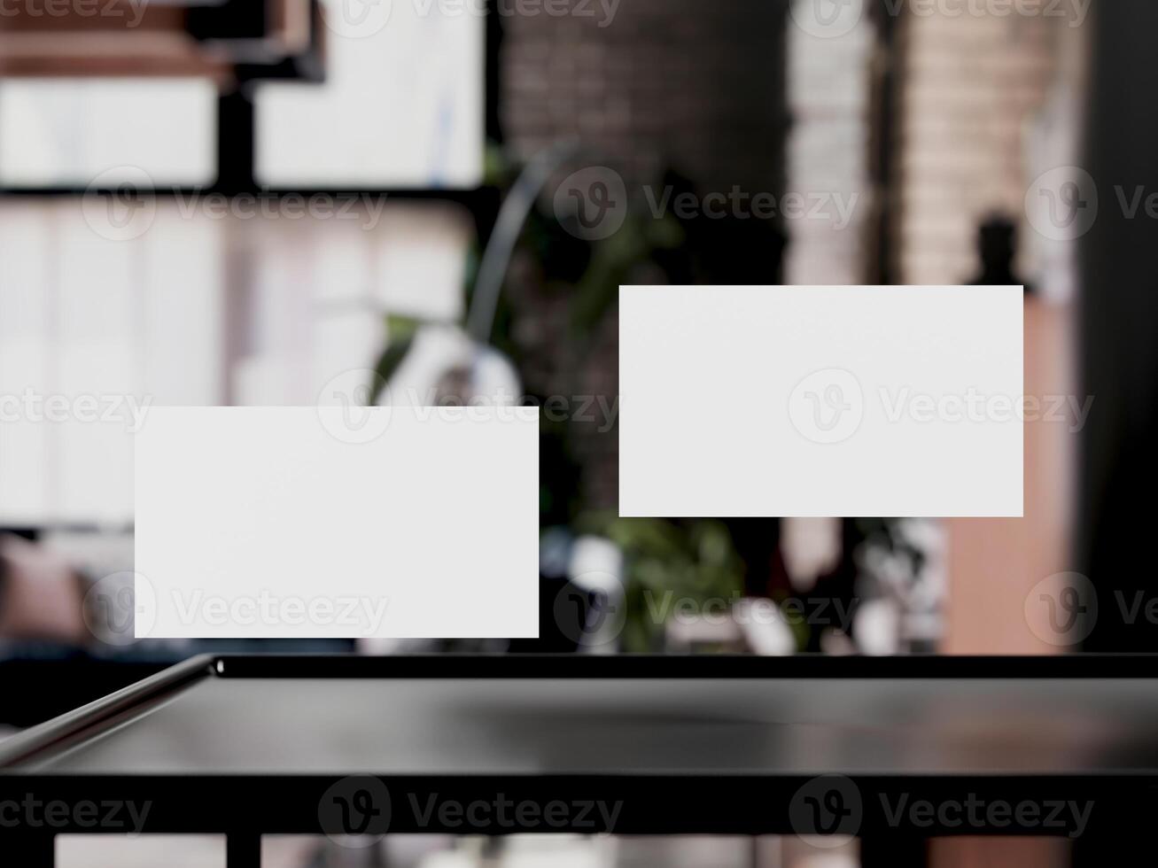 Clean minimal business card mockup on table with office background photo