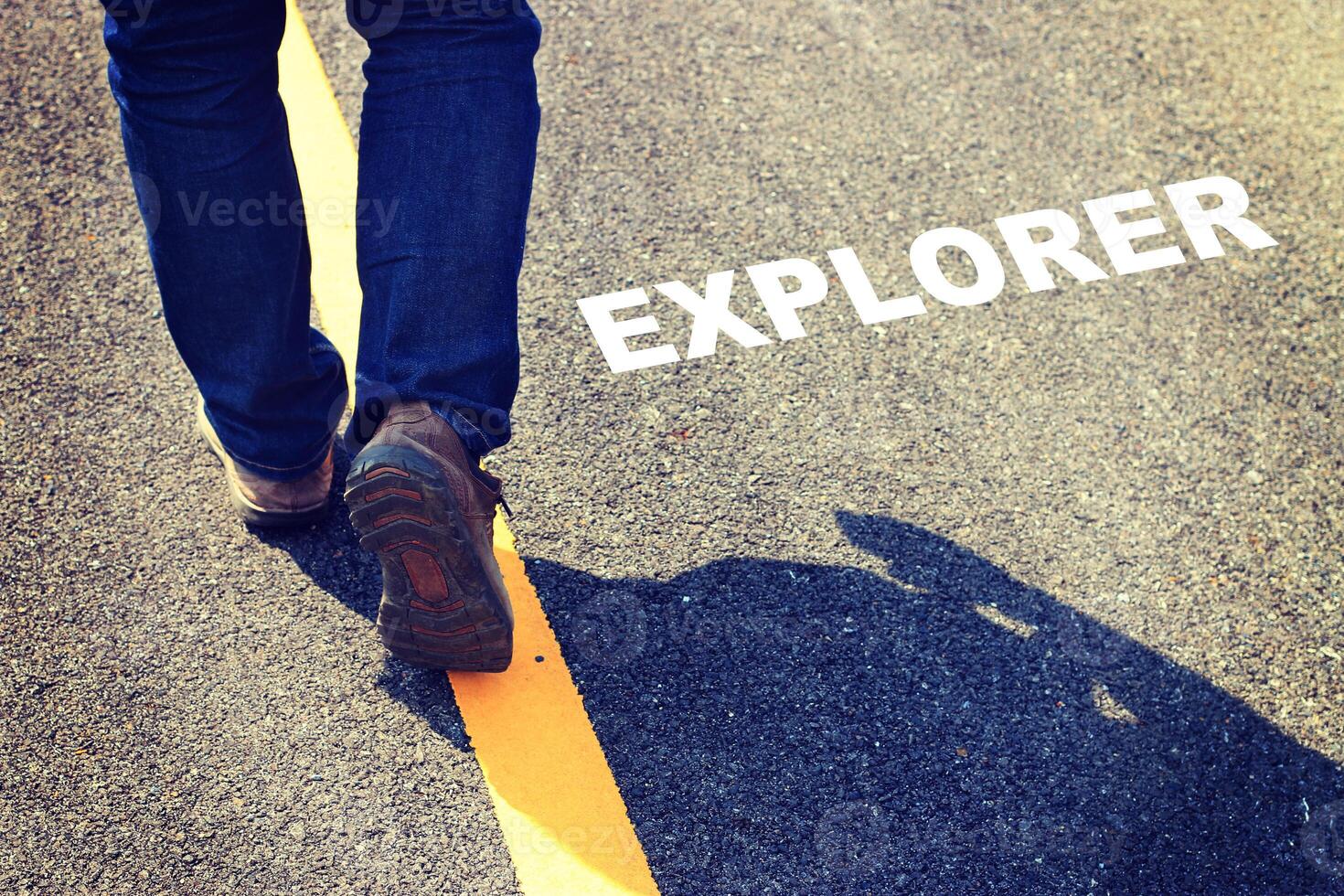 Explorer - a person walking on the road photo