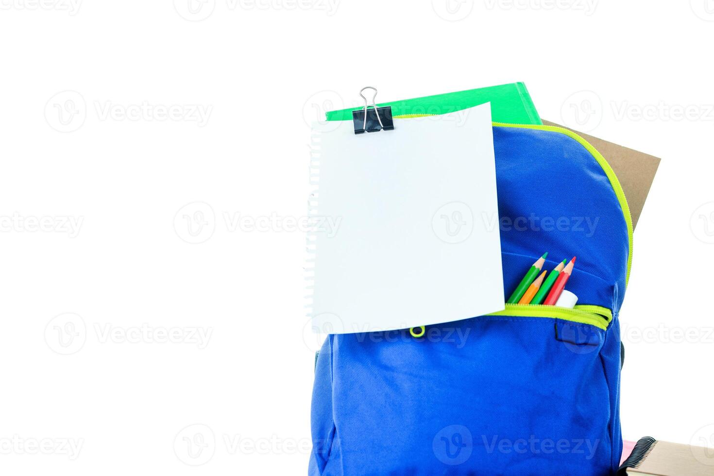 A backpack with school supplies and a note pad photo