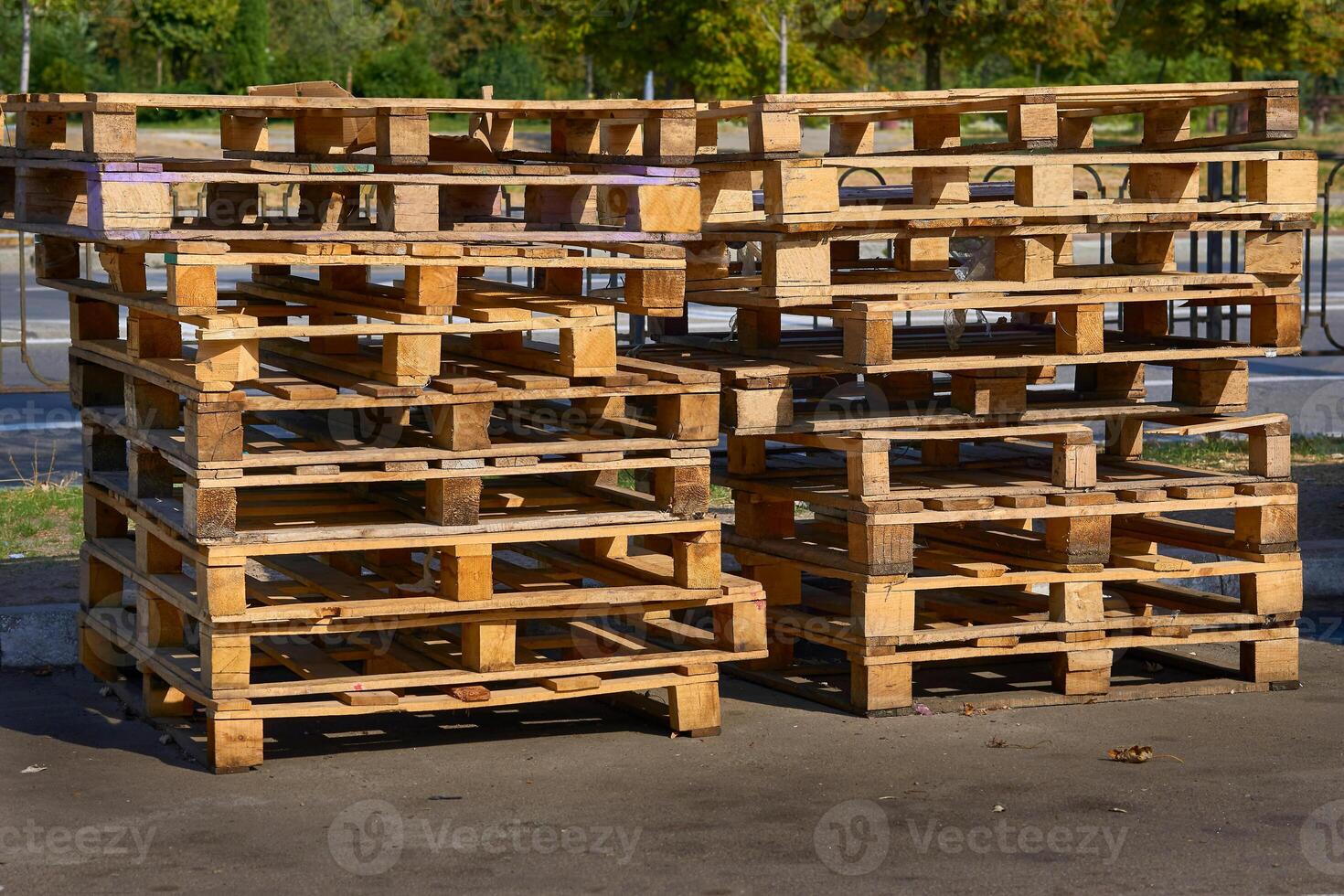 Wooden pallets made of boards for storage, loading, and carrying of goods photo